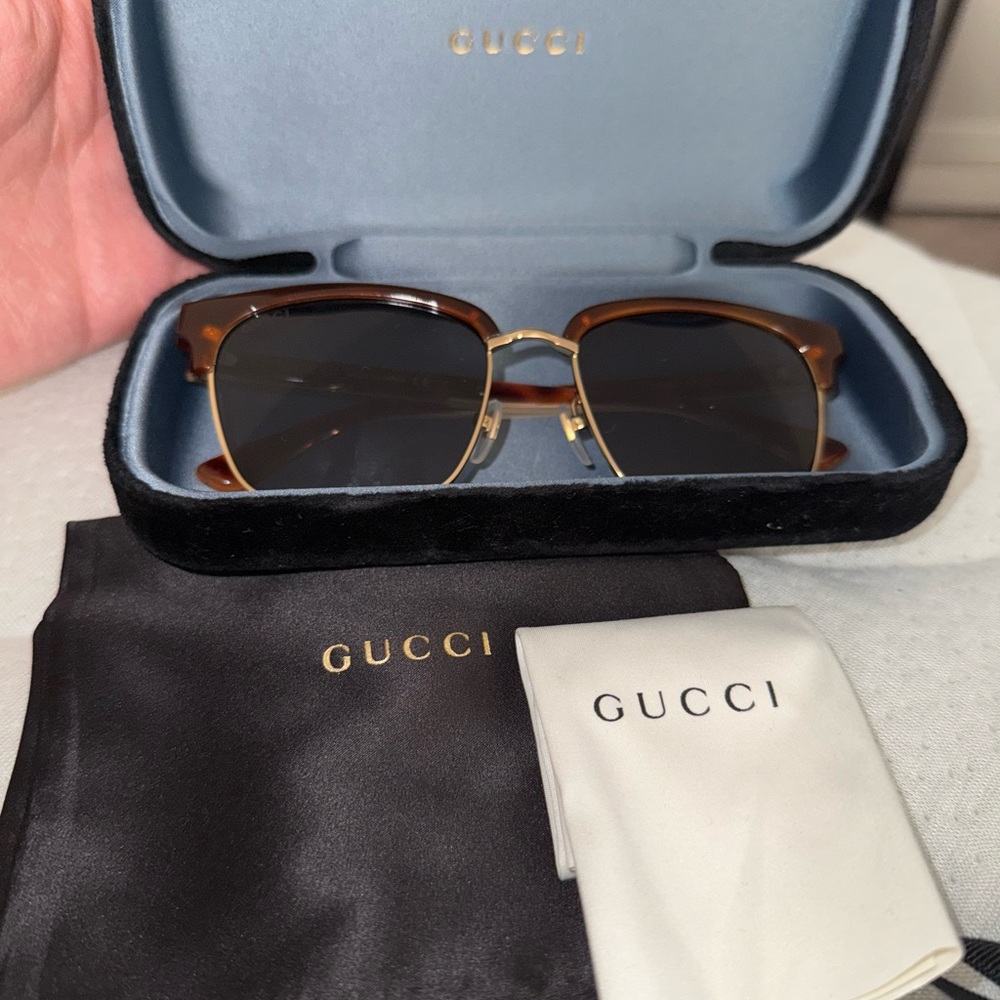 Gucci Sunglasses with Brown Frames and Gold Details